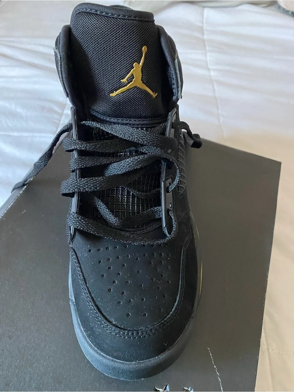 Jordan Men's Black Suede Sneakers with Gold Accent